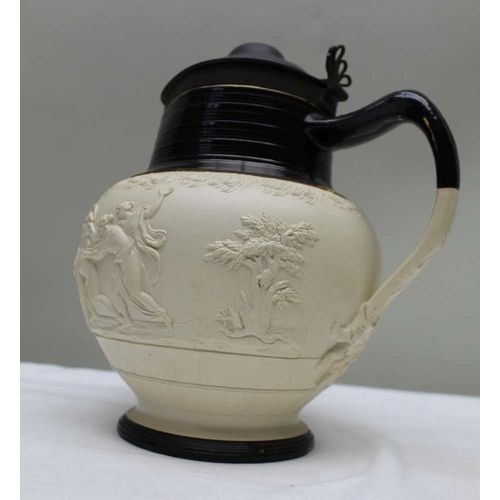 163 - An Adams late 19th century ceramic jug, decorated with moulded bacchanalian, with hinged metal lid. ... 