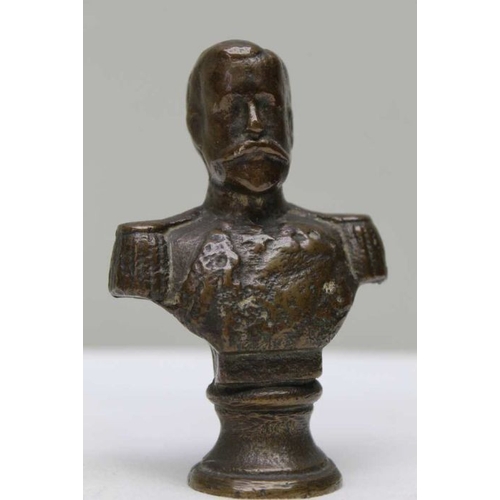 165 - A late 19th century cast bronze bust of a King, 10.5cm, together with a model of the Westminster Cor... 