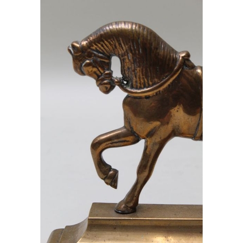 167 - A 19th century brass horse doorstop, 23cm high