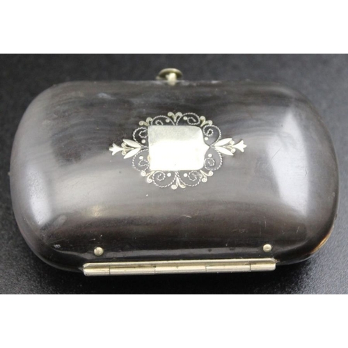 168 - A Victorian oval ebony purse with blue lining, inlaid shield 7 x4.5cm