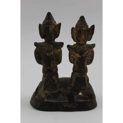 172 - A 19th century cast bronze of two kneeling devotional figures, holding forth offerings, possibly Nep... 