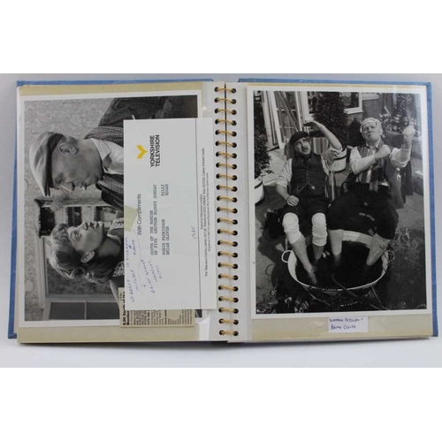 181 - An album of black & white, and colour photographs of Celebrities, includes Frank Sinatra, Judy Garla... 