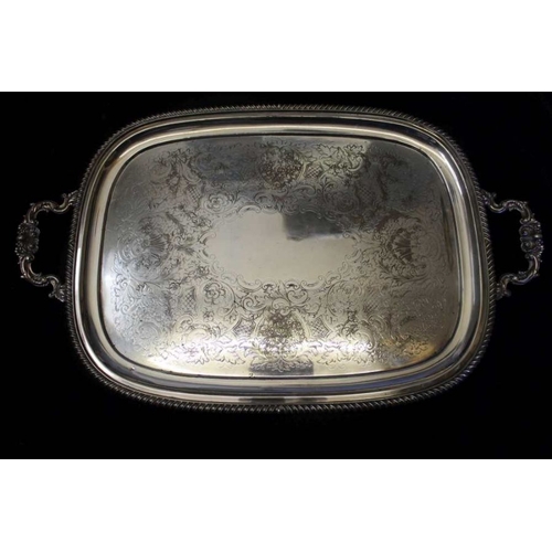 185 - An Edwardian old Sheffield plate two-handled tea tray with cast scallop handles, gadrooned edge, and... 