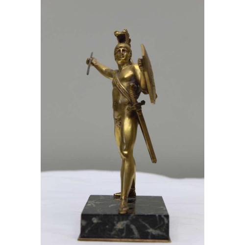 189 - A gilt bronze statue after the Antique, of a gladiator with shield and spear, on polished marble bas... 