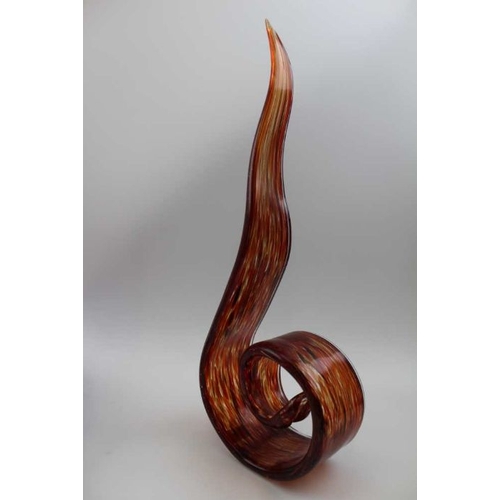 202 - A Murano glass flame sculpture, aventurine inset streaked orange glass, 40cm high, together with a c... 