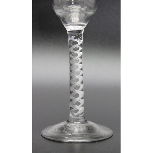 211 - An 18th century air twist cordial glass circa 1760, an 18th century Continental gilded liqueur glass... 