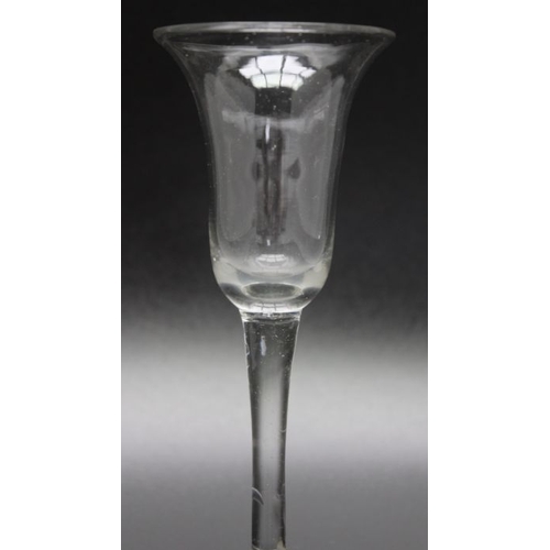 212 - An 18th century plain stem glass, circa 1750 folded foot, partially polished, an 18th century engrav... 