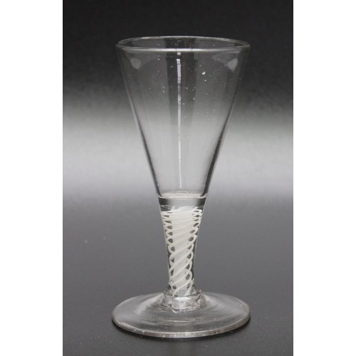 213 - An 18th century opaque twist cordial glass, two piece construction circa 1770, An 18th century bubbl... 