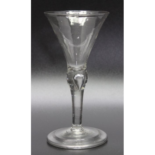 214 - An 18th century bubble stem glass, folded foot circa 1740, an 18th century opaque twist glass, circa... 