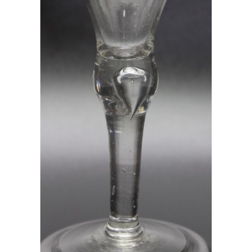 214 - An 18th century bubble stem glass, folded foot circa 1740, an 18th century opaque twist glass, circa... 