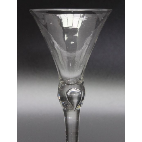 214 - An 18th century bubble stem glass, folded foot circa 1740, an 18th century opaque twist glass, circa... 