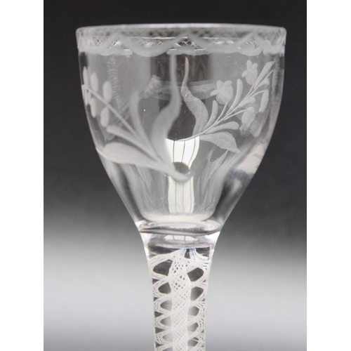 225 - An 18th century opaque twist glass with engraved cordial circa 1770, a large 18th century opaque twi... 