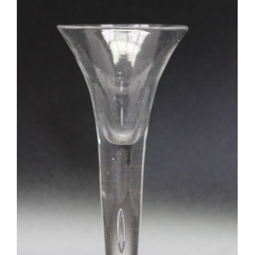 226 - An 18th century bubble stem glass circa 1745, together with an 18th century Continental opaque twist... 