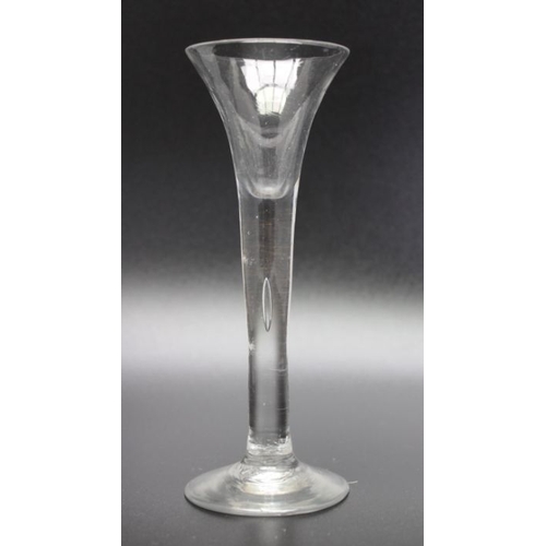 226 - An 18th century bubble stem glass circa 1745, together with an 18th century Continental opaque twist... 