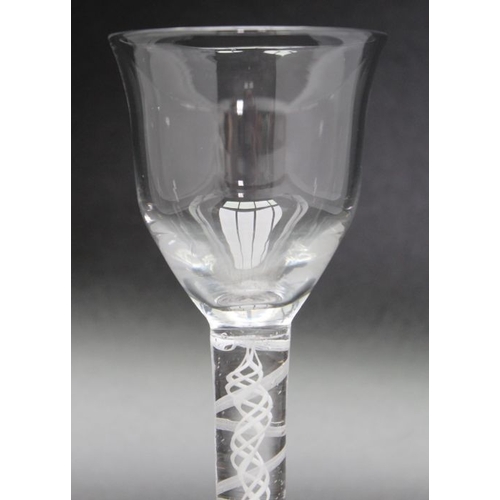 231 - A 18th century opaque twist glass with folded foot circa 1760, together with an 18th century plain s... 