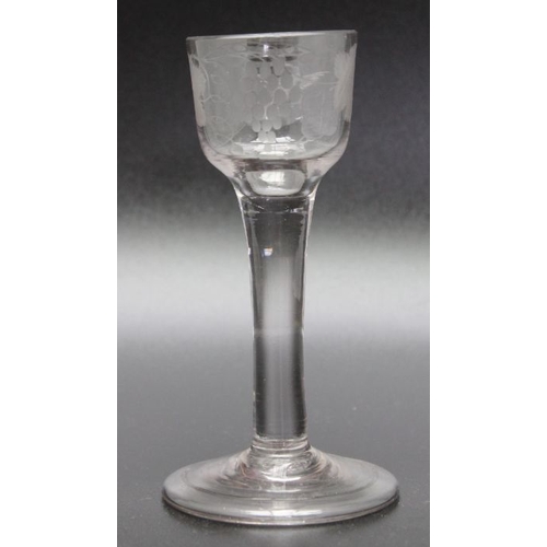 239 - An 18th century engraved plain stem glass 