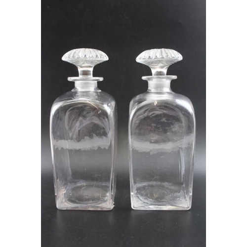 250 - Two pairs of Georgian glass decanters with stoppers the canted pair engraved Hollands and Brandy