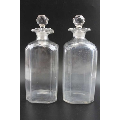 250 - Two pairs of Georgian glass decanters with stoppers the canted pair engraved Hollands and Brandy