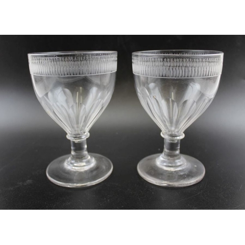 256 - A pair of 19th century wine glasses and one other facet cut (3)