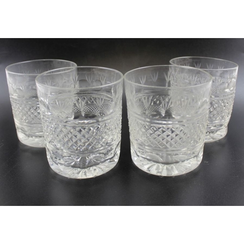 264 - A set of four Cumbria Crystal hobnail and faceted whisky tumblers