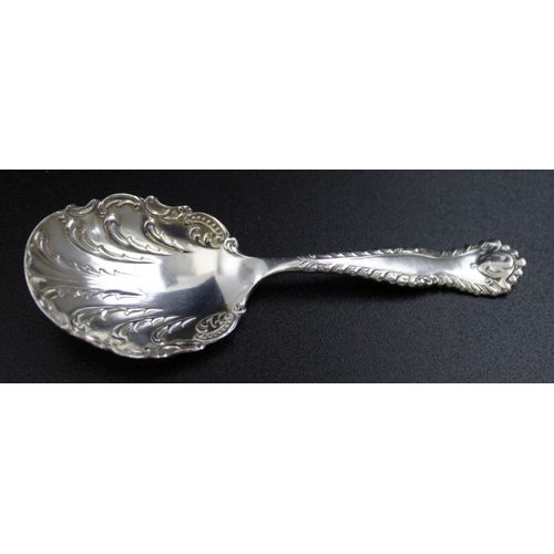 30 - A Victorian silver tea caddy spoon, decoratively cast, scallop form bowl, Birmingham 1899, 19g