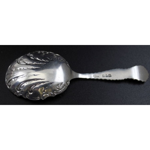 30 - A Victorian silver tea caddy spoon, decoratively cast, scallop form bowl, Birmingham 1899, 19g