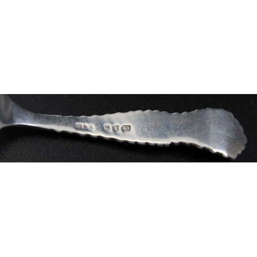 30 - A Victorian silver tea caddy spoon, decoratively cast, scallop form bowl, Birmingham 1899, 19g