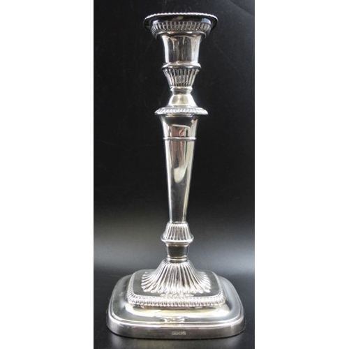 31 - A pair of Victorian silver plated candlesticks, Adam design with gadroon borders, and removable drip... 