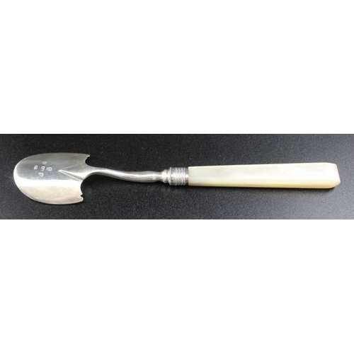 33 - Samuel Pemberton, A George III silver cheese scoop, fitted canted mother-of-pearl handle, Birmingham... 