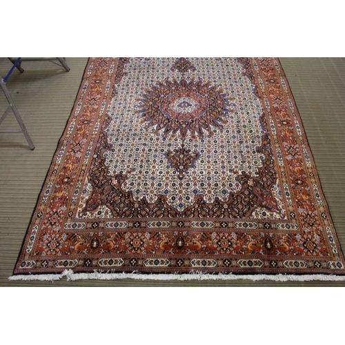 368 - A woven woollen Mood carpet of bookcover design, 294cm x 198cm