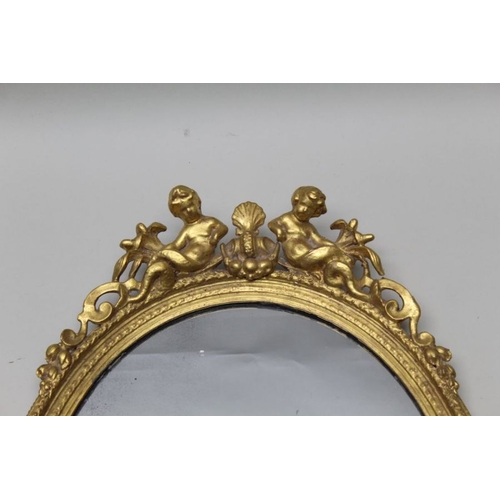 377 - A pair of late 19th century continental gilt framed Girondelle wall mirrors with candle sconces, pla... 