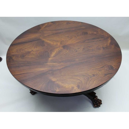 380 - A 19th century rosewood breakfast table, plain column tri-corn plinth with three paw feet, 72cm high... 