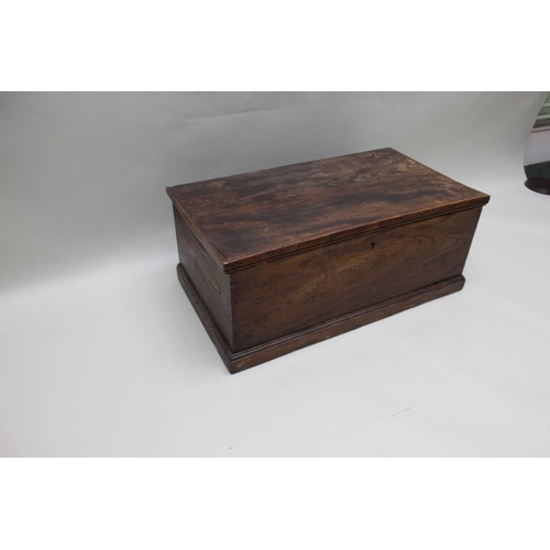 381 - A 19th century elm coffer, the hinged lid revealing a candle box, 82cm wide