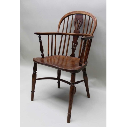 384 - A 19th century provincial open armchair, yew & elm, low hoop back with pierced splat, turned support... 