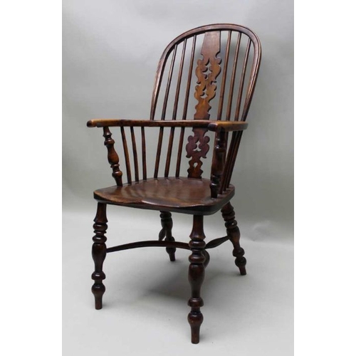 386 - A 19th century provincial hoop stick & pierced splat back, open armchair, yew wood with an elm seat,... 