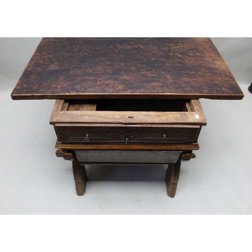 387 - A 19th century Alpine provincial stained pine and walnut folk table, the planked top over a shaped c... 