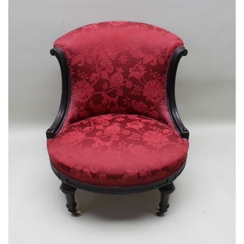 396 - A late Victorian ebonised framed salon chair, patterned crimson fabric upholstery, 80cm high