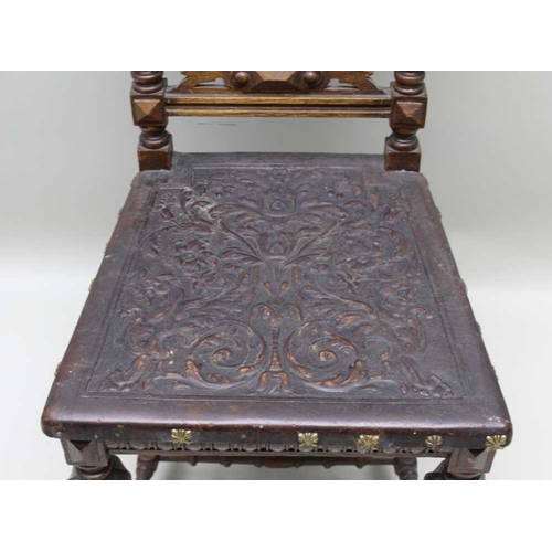 398 - A late 19th century Italian oak framed single chair, embossed studded seat & back