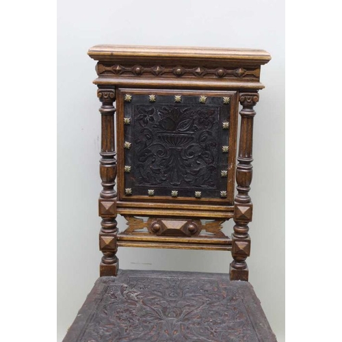 398 - A late 19th century Italian oak framed single chair, embossed studded seat & back