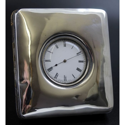 40 - Wagner & Gerstley Ltd. A silver mounted travelling clock, Birmingham 1904, 9cm x 8cm, includes white... 