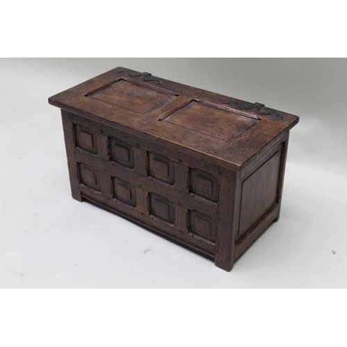 401 - A small 18th century Dutch oak box of coffer form with multi panelled front, lift up lid revealing p... 