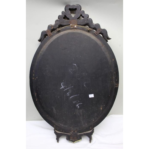 406 - An Antique Venetian design oval plated wall mirror, 73cm