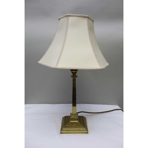 407 - Two brass table lamps, and shades, the tallest 38cm high