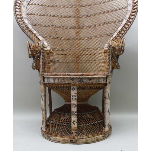 410 - Am early 1970's wicker 'Peacock' chair, with large fan back over a diablo seat natural finish with d... 