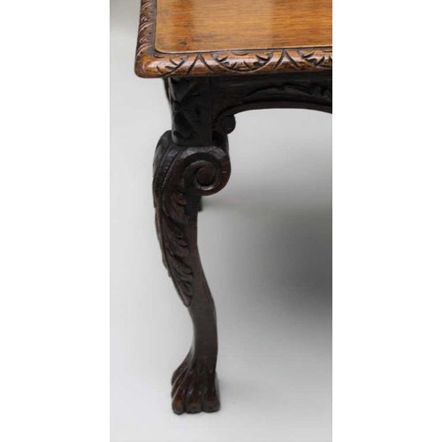 413 - A Victorian 17th century design oak corner chair with carved horse shoe crest on double dolphin supp... 