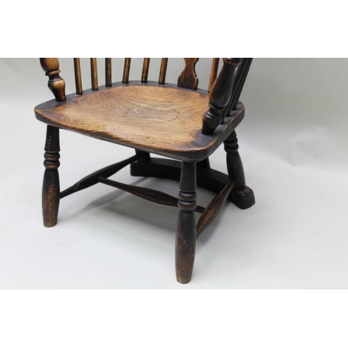 423 - A 19th century stick and splat back armchair