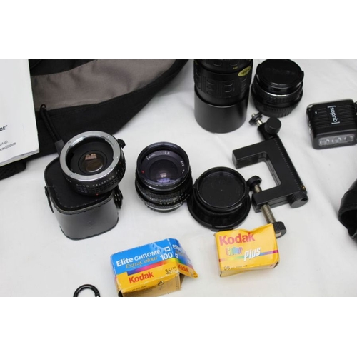 433 - A bag of camera equipment including Pentax SF1 with a collection of lenses, A Panasonic Lumix Leica ... 