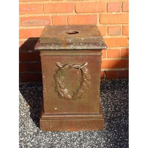 436 - A small ceramic garden urn plinth carrying a barley twist insignia, 43cm