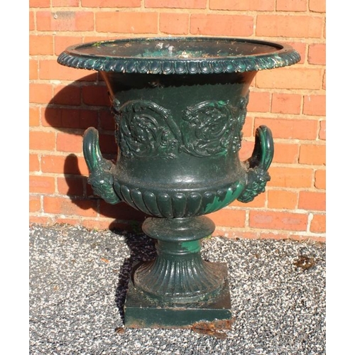 438 - A pair of early 19th century Regency cast iron garden planters, fluted urn form with egg & dart rims