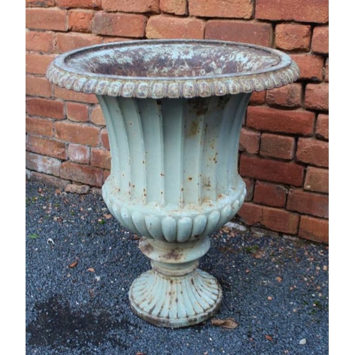 442 - A Regency design cast iron Campana form urn, with egg & dart rim over a fluted waisted body on outsw... 